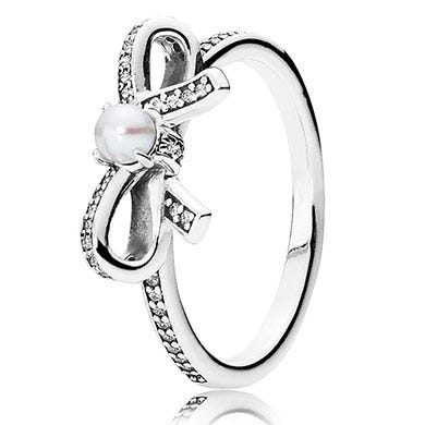Jewellery, Metal, Gemstone, Body jewelry, Mineral, Silver, Earrings, Circle, Wedding ceremony supply, Diamond, 