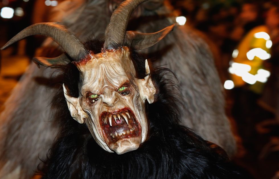 Jaw, Fictional character, Horn, Costume, Demon, Fur, Fiction, Tongue, Natural material, 