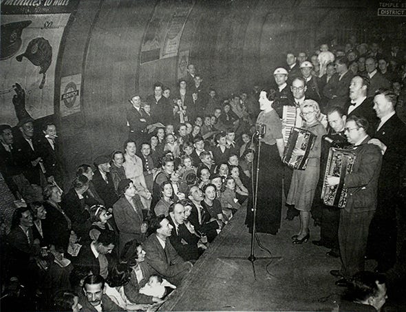 Monochrome, Vintage clothing, Musical ensemble, Accordion, Accordionist, Folk instrument, Tuba, Audience, Wind instrument, Button accordion, 