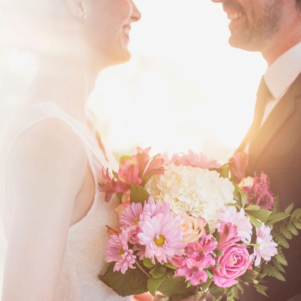 Petal, Bouquet, Bridal clothing, Flower, Photograph, Happy, Bride, Wedding dress, Cut flowers, Floristry, 
