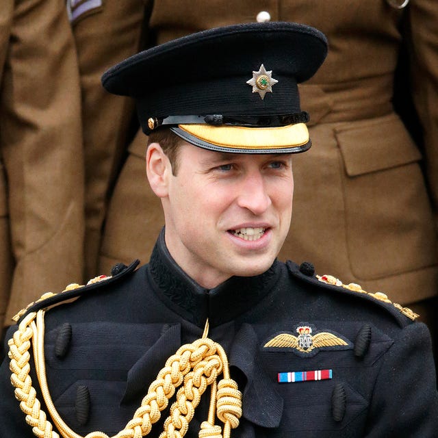 Chin, Uniform, Collar, Cap, Headgear, Peaked cap, Military person, Official, Law enforcement, Costume accessory, 