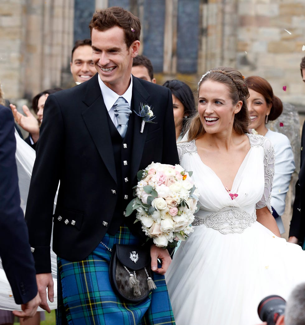 Clothing, Smile, Trousers, Coat, Plaid, Tartan, Dress, Textile, Photograph, Outerwear, 