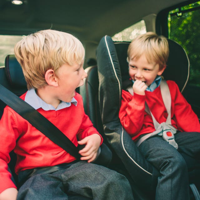 Ear, Comfort, Sitting, Child, Vehicle door, Mammal, Baby & toddler clothing, Toddler, Car seat, Sharing, 
