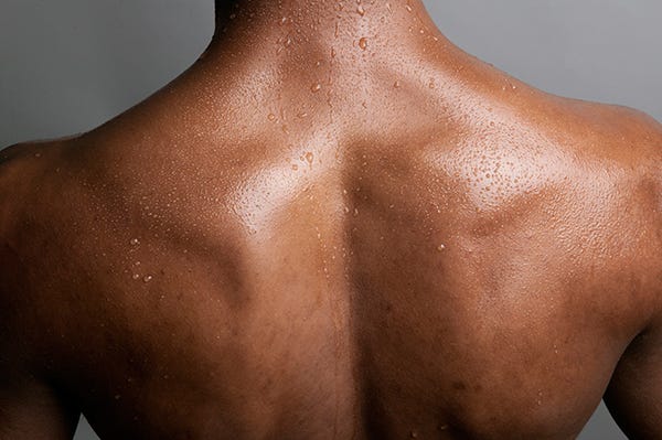 Brown, Skin, Human leg, Joint, Muscle, Tan, Black, Photography, Close-up, Undergarment, 