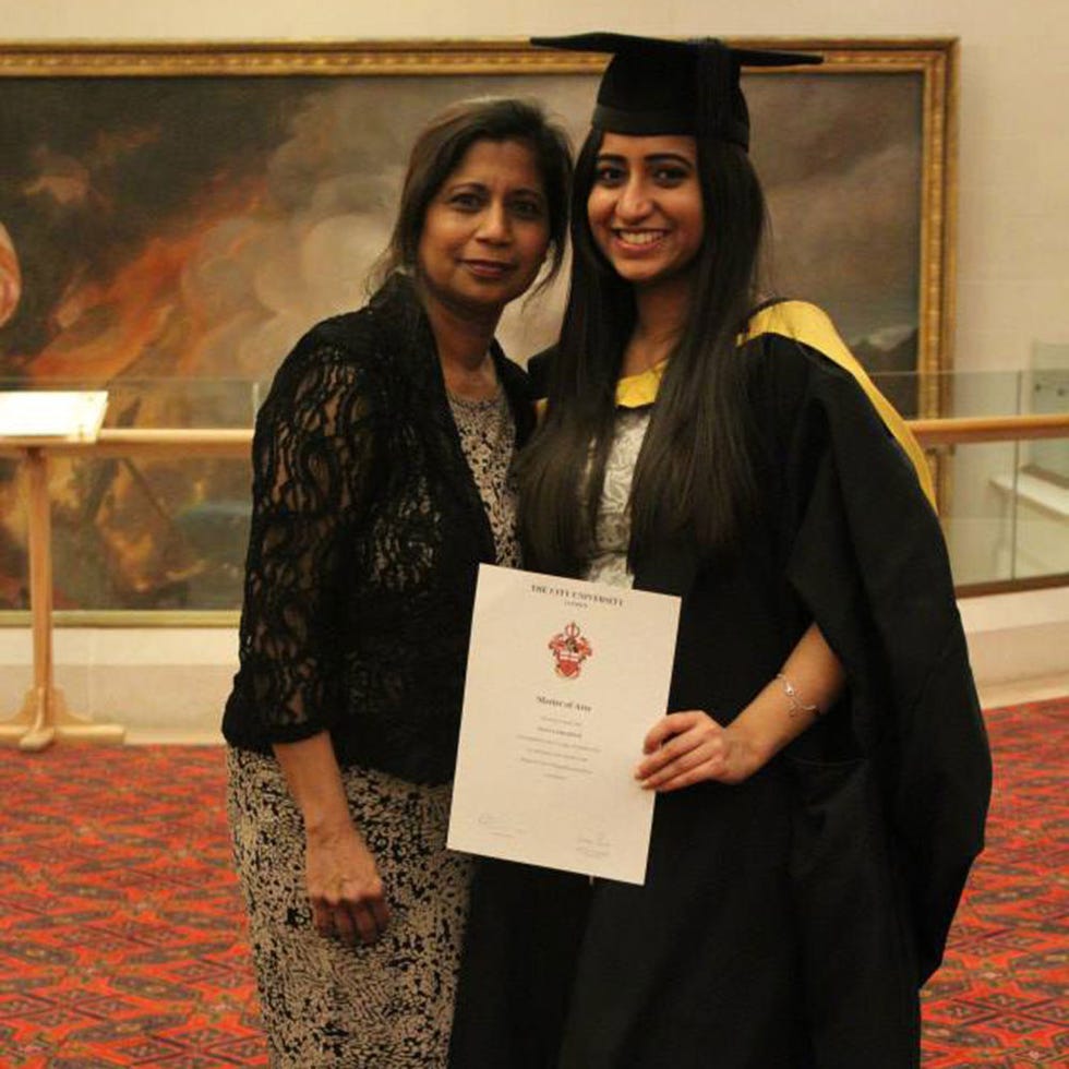 Smile, Academic dress, Event, Scholar, Mortarboard, Graduation, Happy, Facial expression, Headgear, Interaction, 