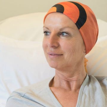 Lip, Forehead, Eyebrow, Orange, Headgear, Wrinkle, Throat, Swim cap, Linens, 
