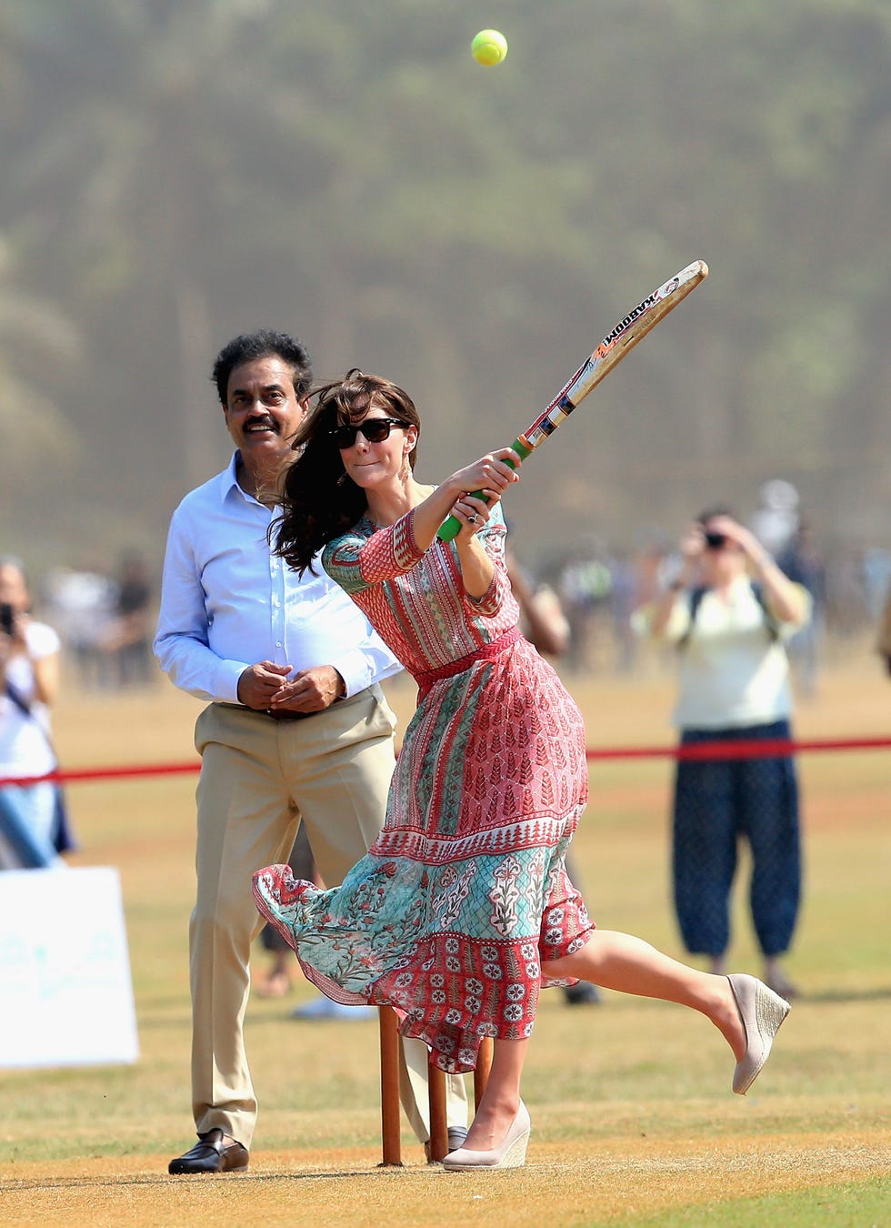 Eyewear, Sunglasses, Dress, Summer, Interaction, Playing sports, Ball, One-piece garment, Gesture, Spring, 