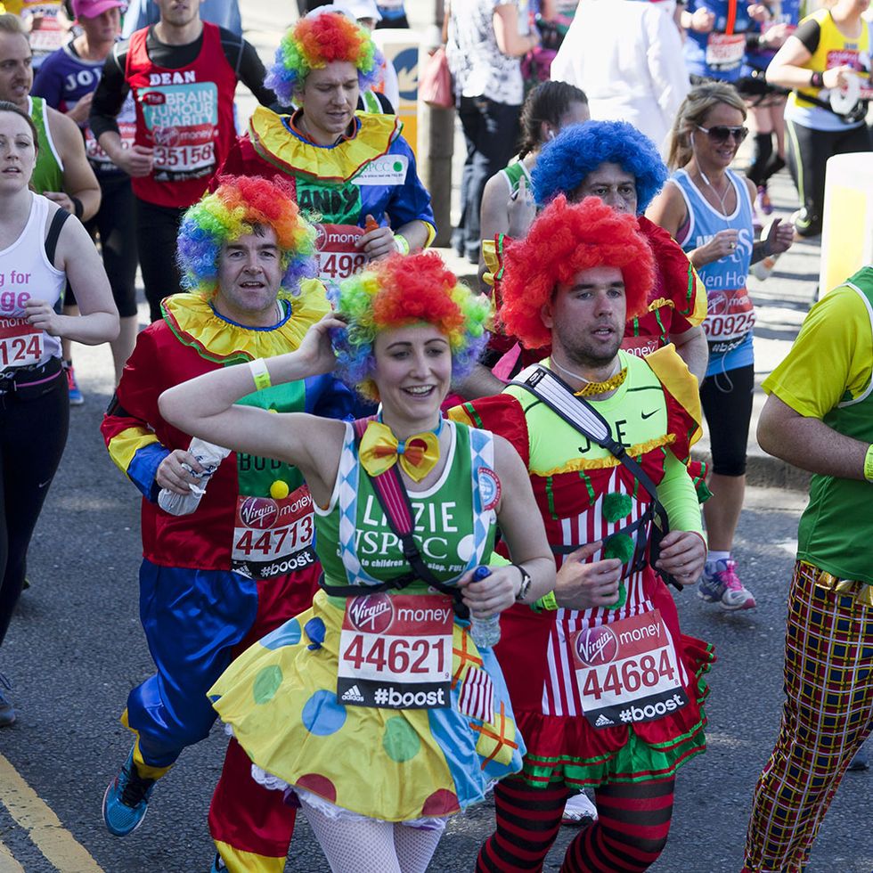 People, Crowd, Costume, Public event, Team, Wig, Long-distance running, Hair coloring, Festival, Marathon, 