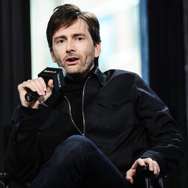 Arm, Human body, Hand, Jacket, Sitting, Street fashion, Facial hair, Curtain, Leather, 