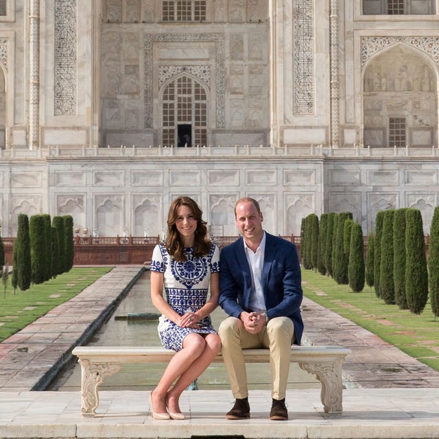 Trousers, Coat, Outerwear, Interaction, Suit, Shrub, Hedge, Palace, Arch, Classical architecture, 