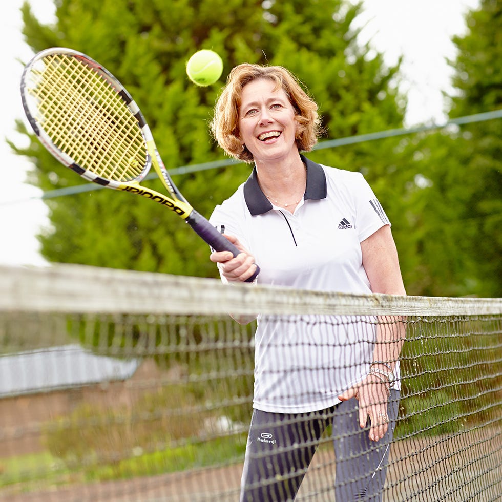 Lip, Daytime, Sports equipment, Skin, Photograph, Standing, Leisure, Elbow, Playing sports, Summer, 