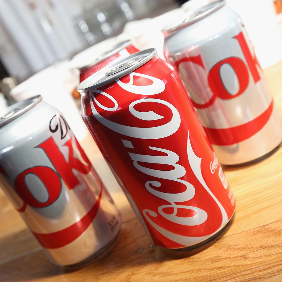 Beverage can, Aluminum can, Tin can, Photograph, Drink, Carbonated soft drinks, Tin, Logo, Font, Carmine, 