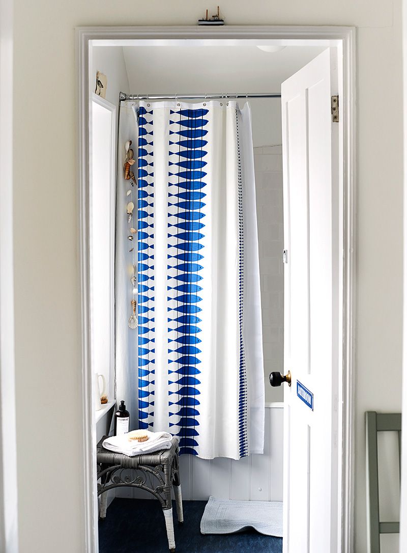 Blue, Room, Interior design, Wall, Window treatment, Fixture, Azure, Towel, Window covering, Shower curtain, 