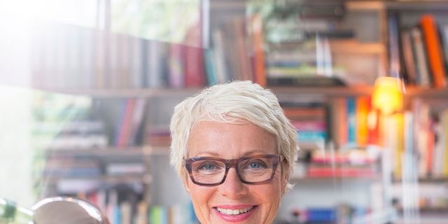 Eyewear, Glasses, Vision care, Product, Shelf, Happy, Facial expression, Shelving, Publication, Bookcase, 