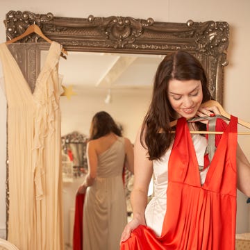 Clothing, Red, Dress, Formal wear, Peach, Fashion, Shoulder, Fashion design, Room, Textile, 