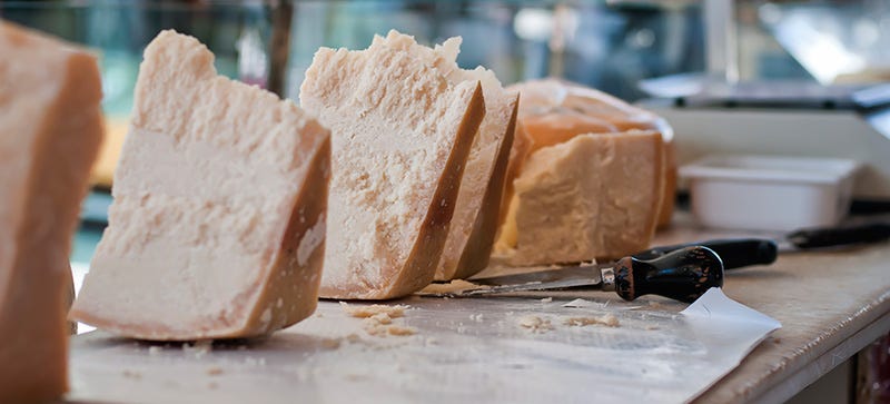 Food, Ingredient, Cuisine, Bread, Baked goods, Kitchen utensil, Dairy, Parmigiano-reggiano, Cutlery, Sheep milk cheese, 