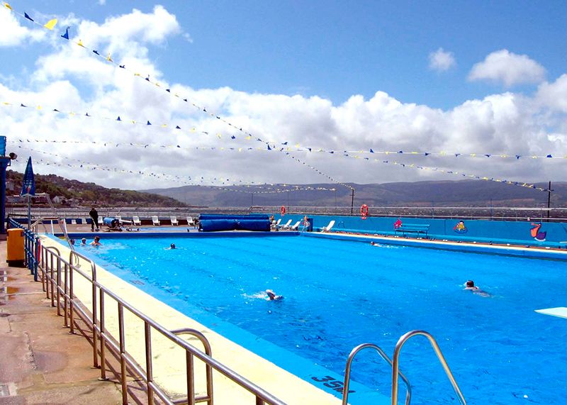 Swimming pool, Cloud, Leisure, Recreation, Swimmer, Sports, Competition event, Azure, Sports gear, Competition, 