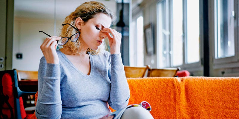 Comfort, Sitting, Eyelash, Neck, Hearing, Earrings, Necklace, Sweater, Long hair, Gadget, 