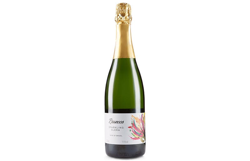 Glass bottle, Bottle, Drink, Alcoholic beverage, Logo, Label, Wine bottle, Alcohol, Bottle cap, Trademark, 
