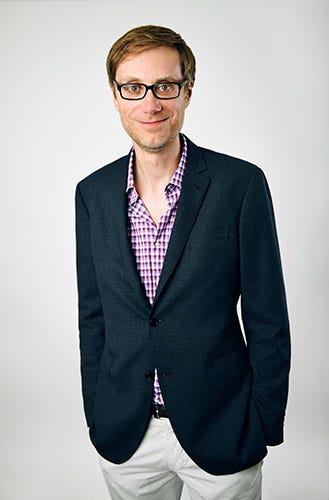 Clothing, Eyewear, Glasses, Vision care, Collar, Dress shirt, Sleeve, Shoulder, Coat, Standing, 