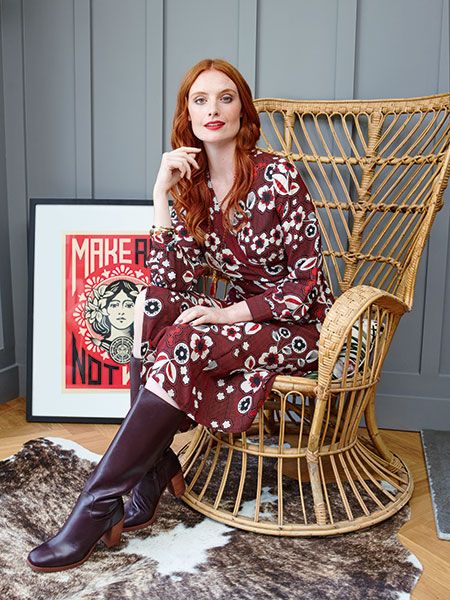 Textile, Dress, Boot, Fashion, Street fashion, Riding boot, Picture frame, Red hair, Fashion model, Day dress, 
