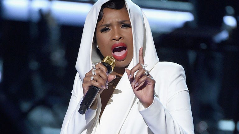 Lip, Finger, Audio equipment, Microphone, Technology, Singing, Song, Singer, Street fashion, Scarf, 