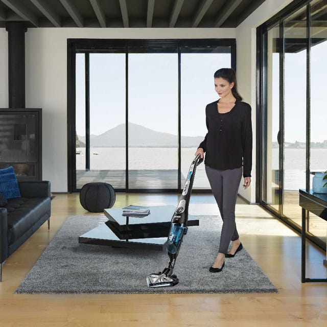 Floor, Flooring, Couch, Living room, Vacuum cleaner, Laminate flooring, Cleanliness, studio couch, Wood flooring, Cleaner, 