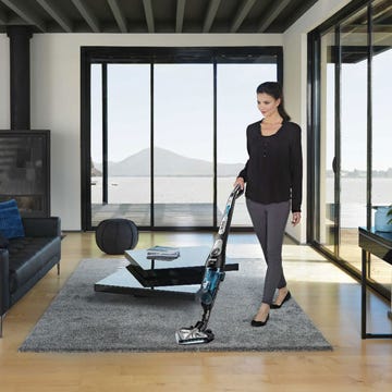Floor, Flooring, Couch, Living room, Vacuum cleaner, Laminate flooring, Cleanliness, studio couch, Wood flooring, Cleaner, 
