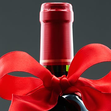 Red, Ribbon, Water bottle, Bottle, Material property, Drinkware, Tableware, Plastic, Wheel, 