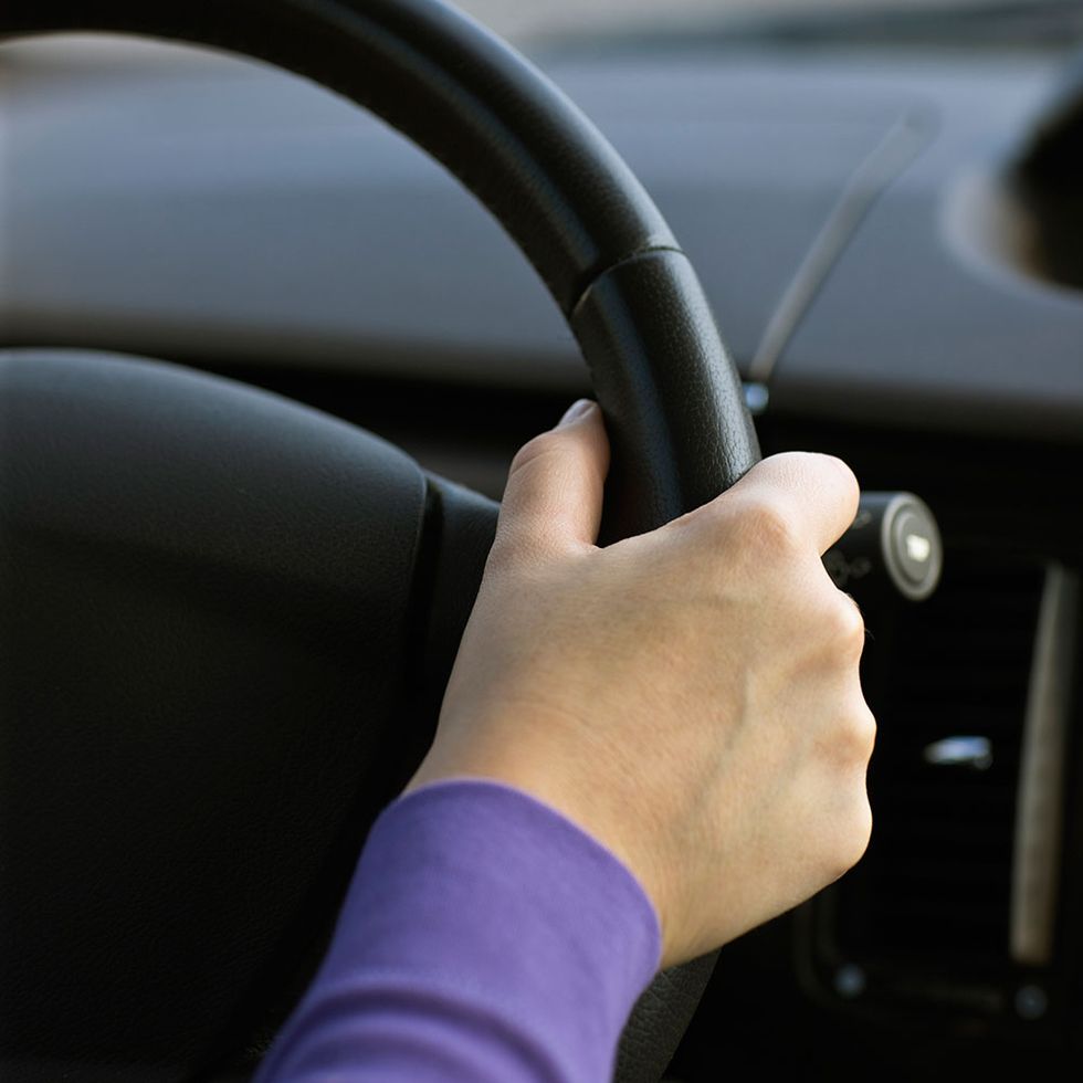 Finger, Automotive design, Steering part, Steering wheel, Vehicle door, Fixture, Windshield, Automotive window part, Thumb, Automotive side-view mirror, 