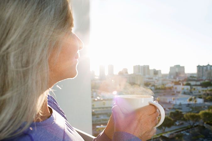 Sunlight, Blond, Brown hair, Tower block, Coffee cup, Cup, 
