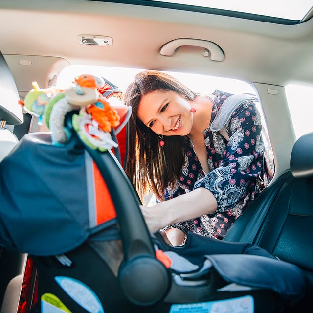 Comfort, Vehicle door, Car seat, Head restraint, Toy, Service, Passenger, Car seat cover, Long hair, Air travel, 