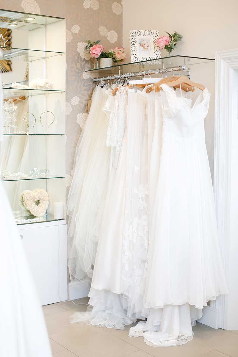 Floor, Textile, White, Dress, Interior design, Room, Petal, Flooring, Wedding dress, Cut flowers, 