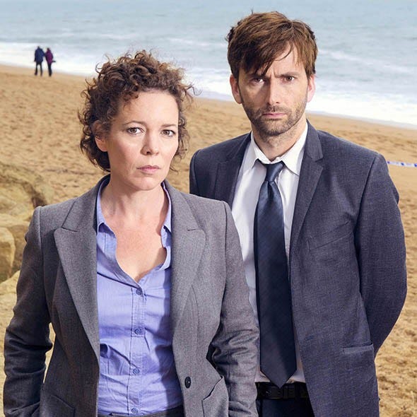 Clothing, Dress shirt, Collar, Coat, Shirt, Coastal and oceanic landforms, Outerwear, Sand, Tie, Ocean, 