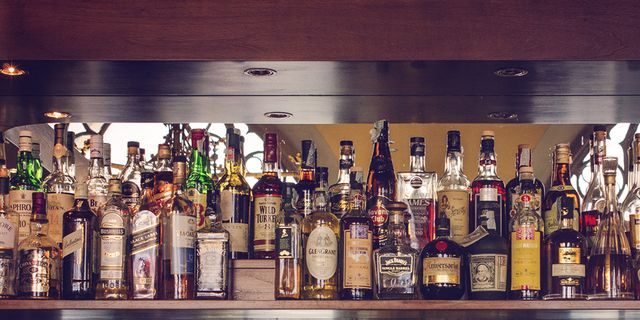Glass bottle, Alcohol, Drink, Bottle, Alcoholic beverage, Distilled beverage, Liquid, Drinking establishment, Barware, Pub, 