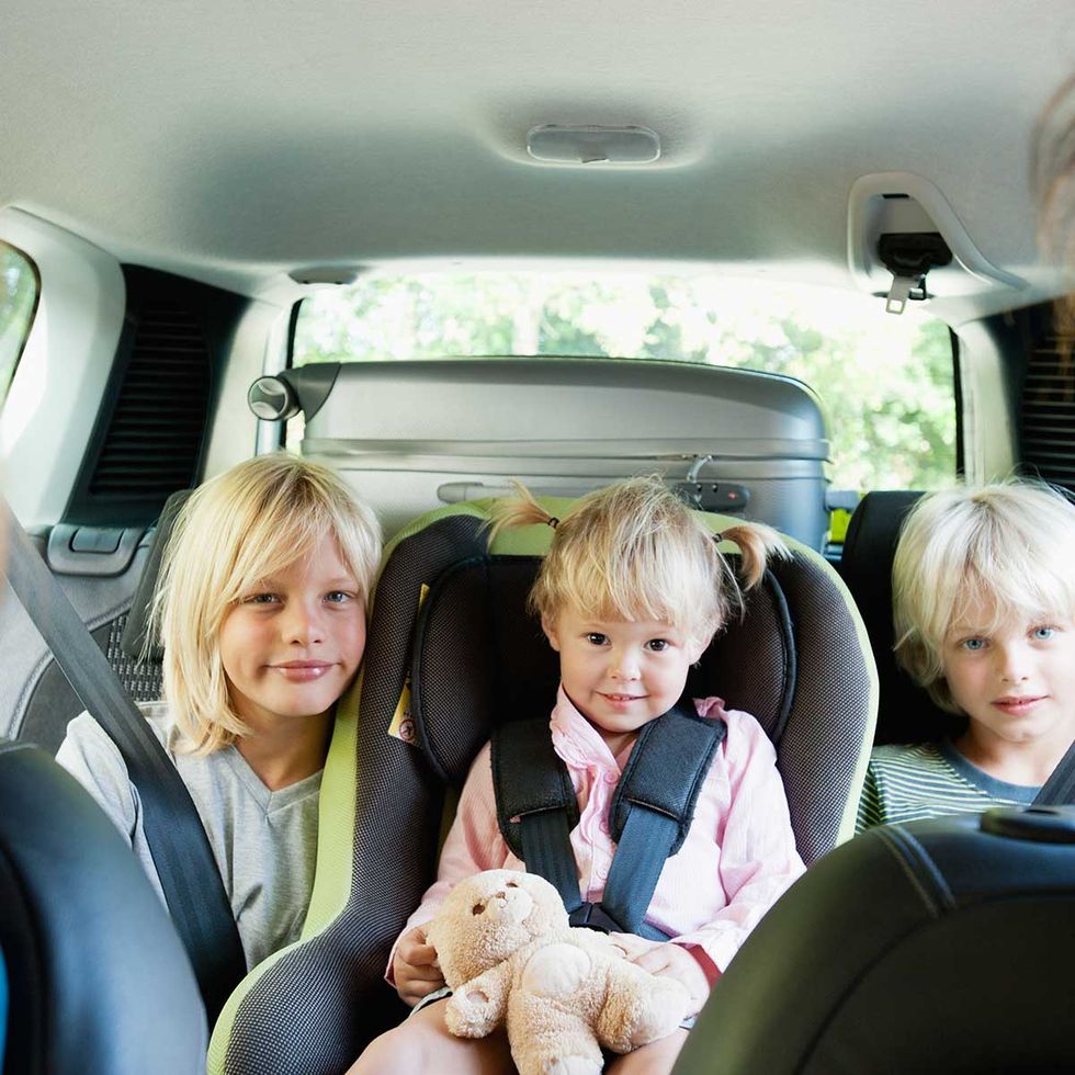 People, Child, Car seat, Baby in car seat, Family car, Vehicle, Car, Luxury vehicle, Passenger, Vacation, 