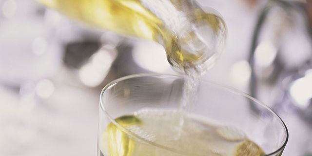 Fluid, Glass, Yellow, Drinkware, Drink, Alcoholic beverage, Tableware, Cocktail, Liquid, Distilled beverage, 