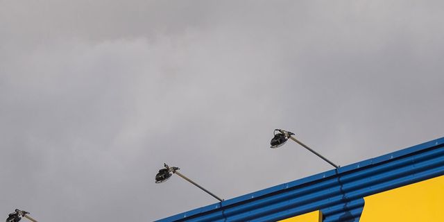 Blue, Sky, Yellow, Line, Daytime, Roof, Orange, Architecture, Wall, Cloud, 