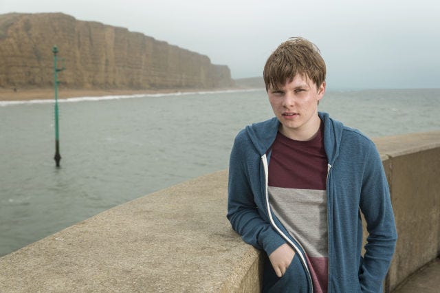 Coastal and oceanic landforms, Coast, Travel, Street fashion, Jacket, Bag, Sea, Lake district, Bay, Escarpment, 