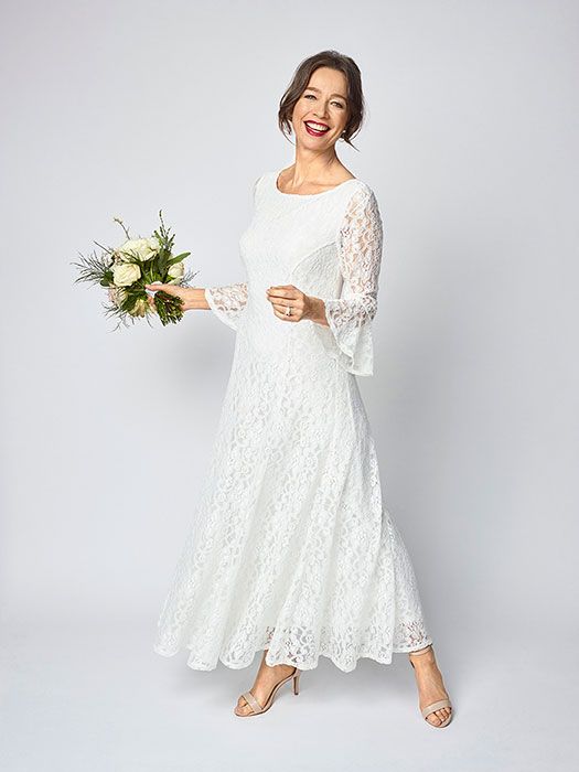 Clothing, Sleeve, Dress, Shoulder, Textile, Photograph, Joint, Bridal clothing, White, Facial expression, 