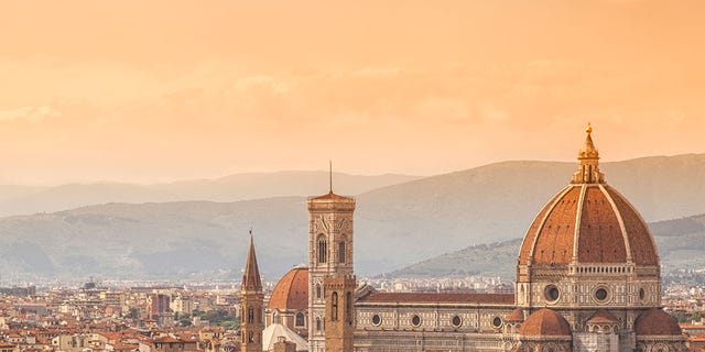 City, Landmark, Sky, Cityscape, Urban area, Town, Human settlement, Architecture, Dome, Building, 