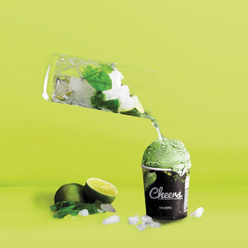 Green, Liquid, Glass bottle, Bottle, Drink, Still life photography, Lemon, Chemical compound, Fruit, Label, 