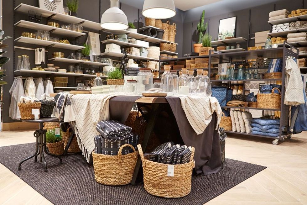 Tablecloth, Linens, Basket, Home accessories, Light fixture, Wicker, Retail, Storage basket, Shelving, Shelf, 