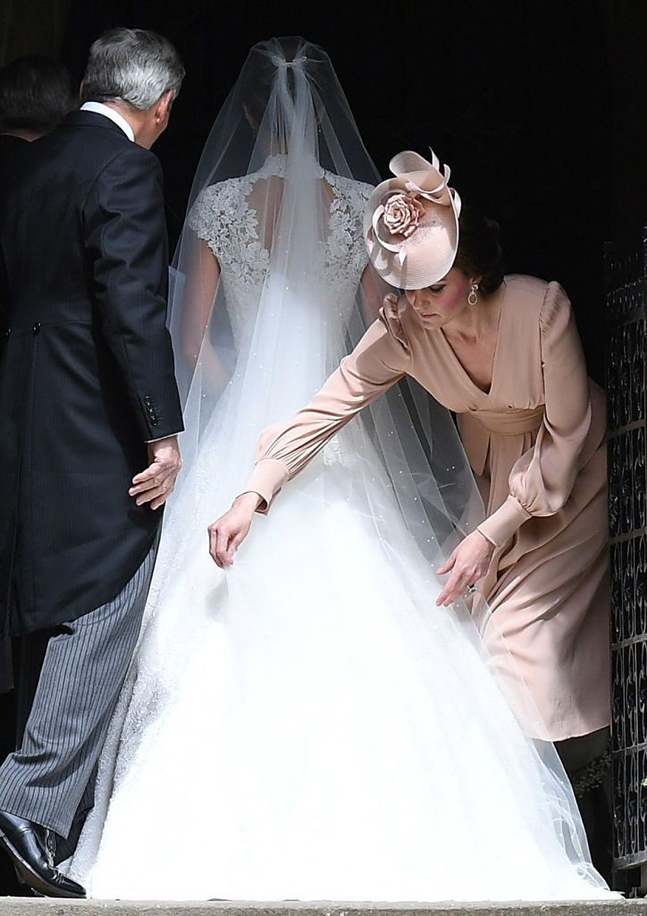 Bridal veil, Bridal clothing, Trousers, Veil, Coat, Dress, Photograph, Bridal accessory, Suit, Wedding dress, 
