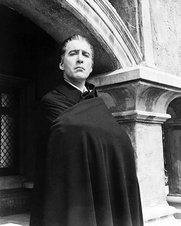 Standing, Monochrome, Monochrome photography, Black-and-white, Portrait, Cloak, Column, Vintage clothing, Portrait photography, Religious institute, 