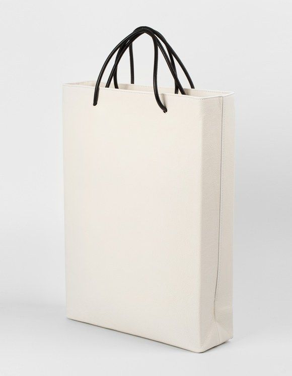 Paper bag, Shopping bag, Bag, Packaging and labeling, Luggage and bags, Handbag, Material property, Office supplies, Beige, Fashion accessory, 