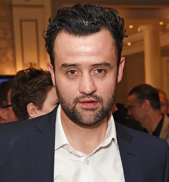 Hair, Ear, Lip, Facial hair, Mouth, Hairstyle, Chin, Forehead, Eyebrow, Dress shirt, 