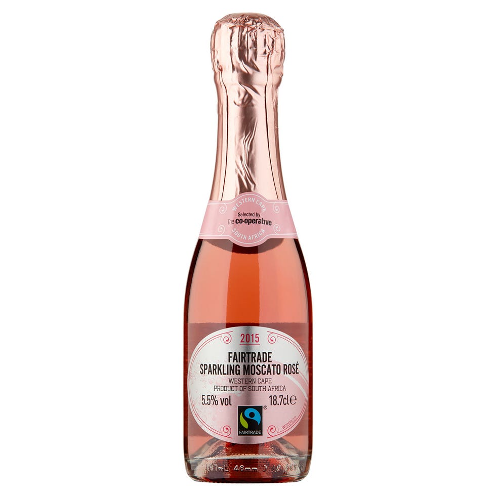 Liquid, Bottle, Logo, Bottle cap, Peach, Label, Glass bottle, Sticker, Packaging and labeling, 