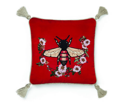 Red, Textile, Pillow, Cushion, Patchwork, Throw pillow, Linens, Furniture, Fictional character, 