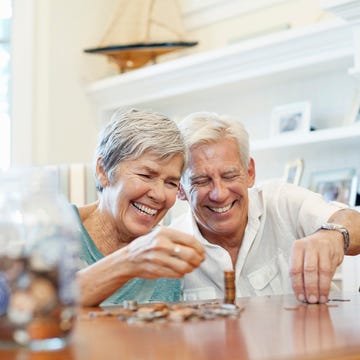 Smile, Hand, Happy, Tooth, Watch, Lampshade, Laugh, Wrinkle, Light fixture, Shelf, 